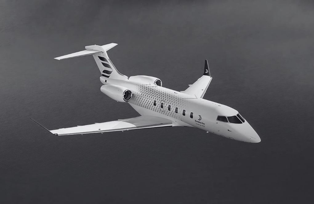 Black and white aerial view of a white private jet flying over the ocean.